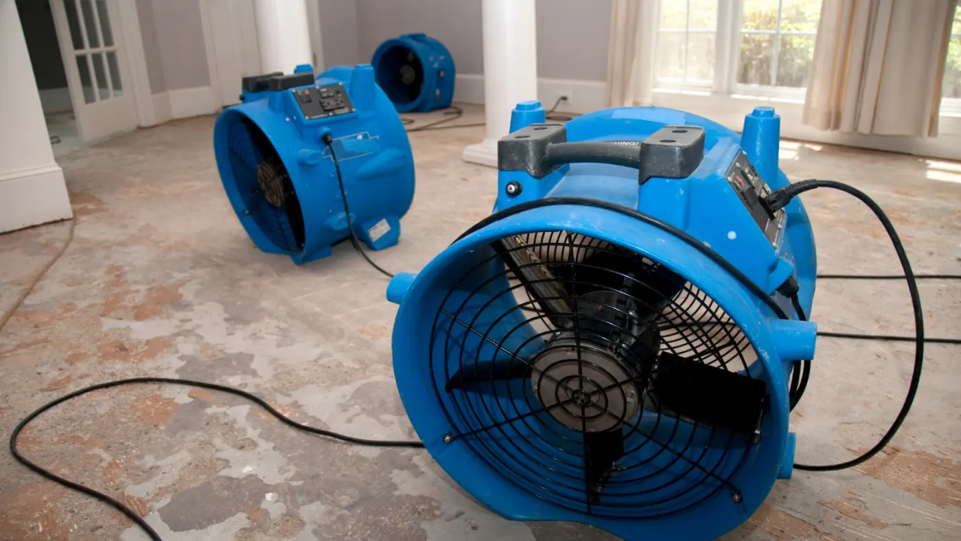 Air movers and dehumidifiers running in Attica Indiana home dry-out